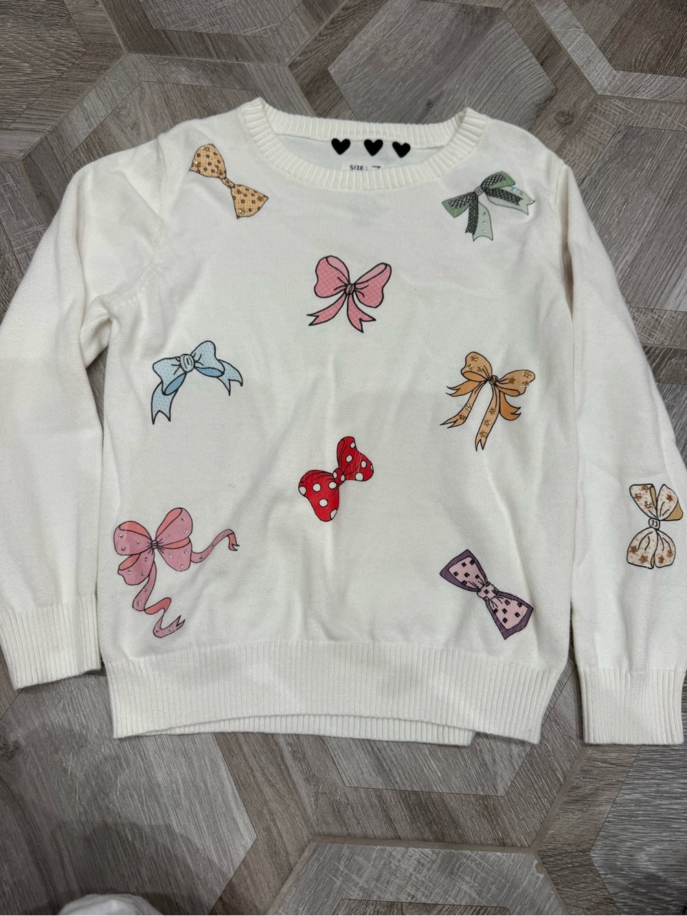 Girls Cream Sweater with Multicolor Bow Print